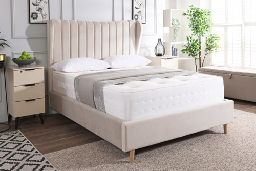 Asha upholstered bed in cream with mattress